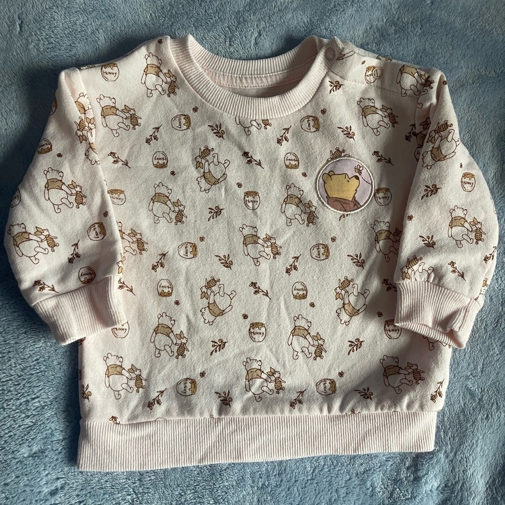 Disney Cream Sweatshirt with Bear Pattern